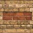 masonry bricks in stone wall