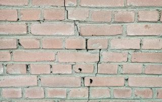 Signs it's time to replaced or repair cracked masonry.