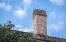 Historic chimney featuring brickwork.